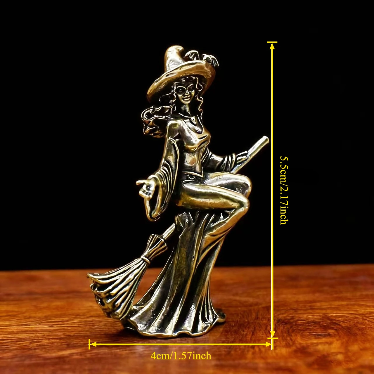 Creative brass broom-and-moon figurine, perfect for living room tabletops and home decor—a wizard statue