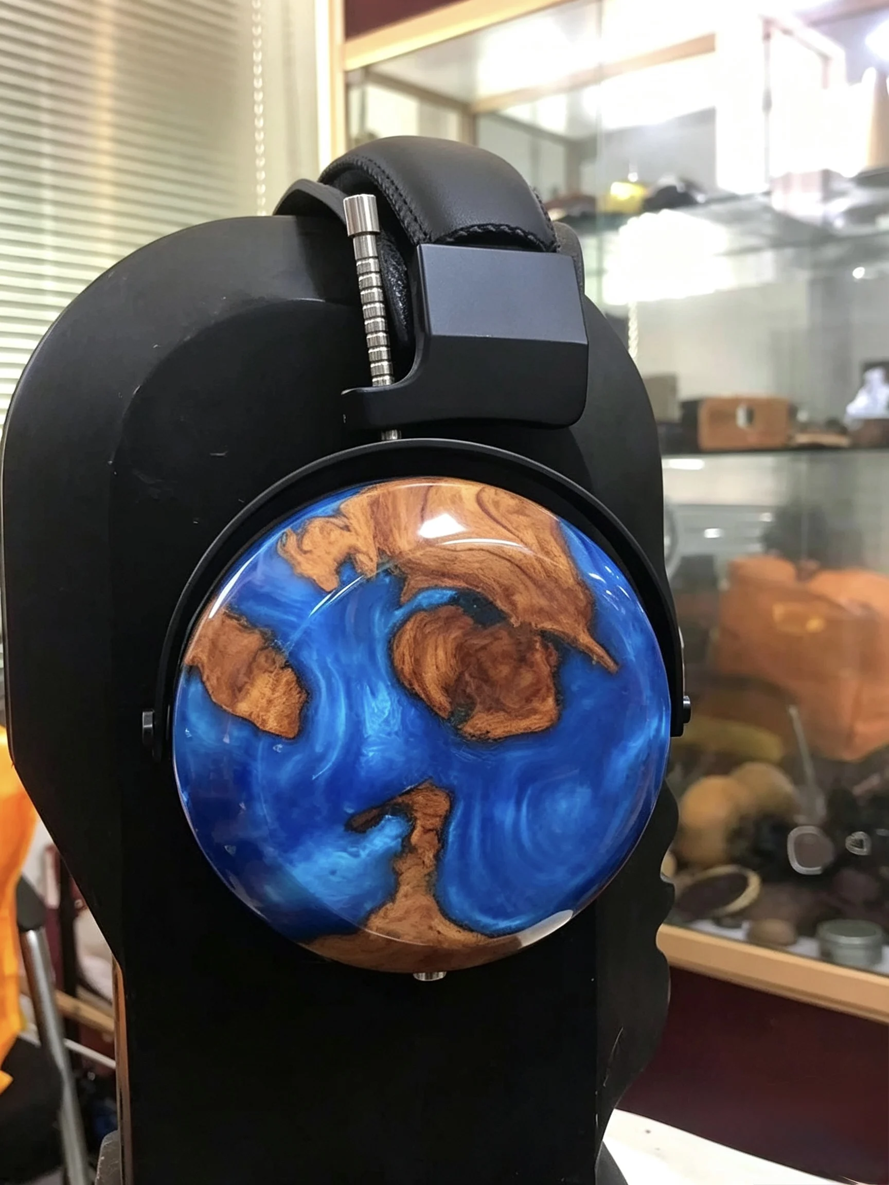 Closed-back headphones with solid wood construction, each piece featuring unique, vibrant, and beautiful grain patterns of high