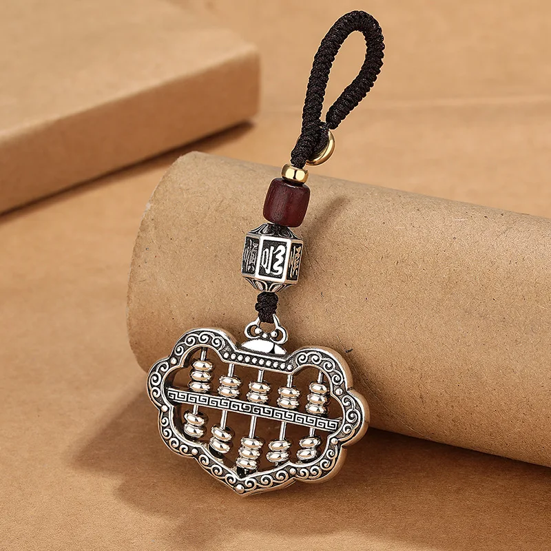 Retro ethnic style auspicious cloud abacus car keychain women's used safety lock niche creative hanging decoration.