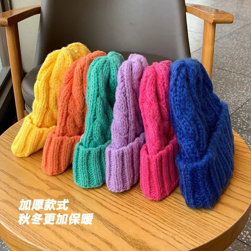 Knitted women's hats winter thickened fashion warm twist Korean version retro versatile ear protectors wool hats stack