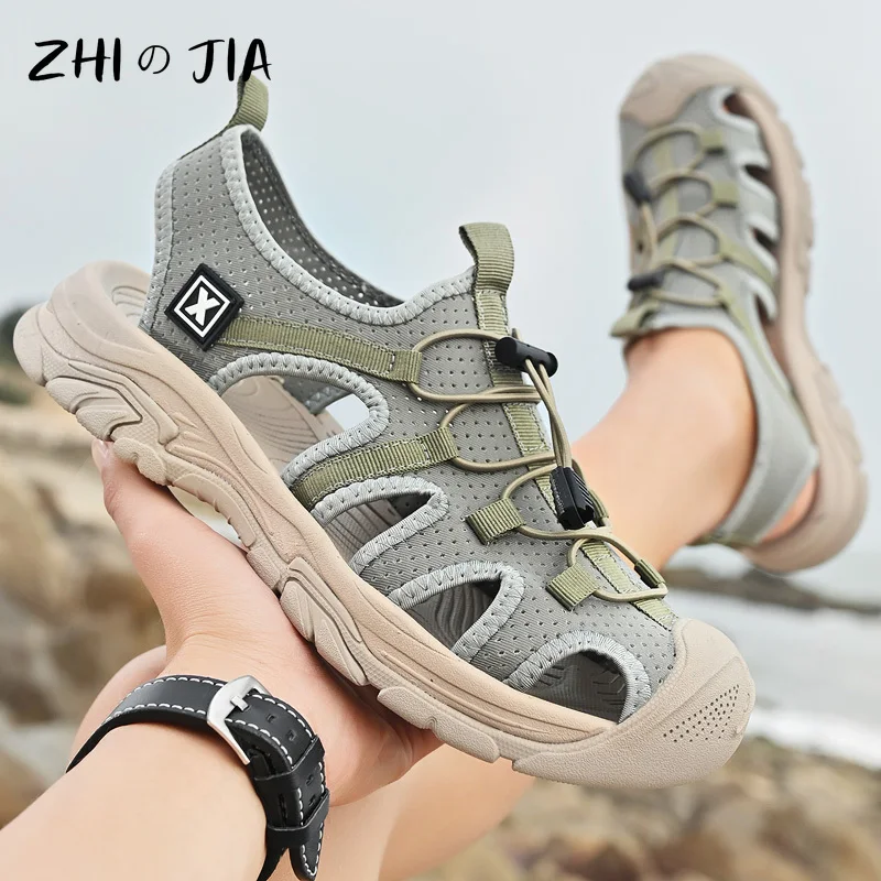 أحذية شاطئ مجوفة صيفية قابلة للتنفس للرجال صنادل رياضية خارجية مانعة للانزلاق أحذية كاجوال كبيرة مريحة سهلة الارتداء أحذية مسطحة