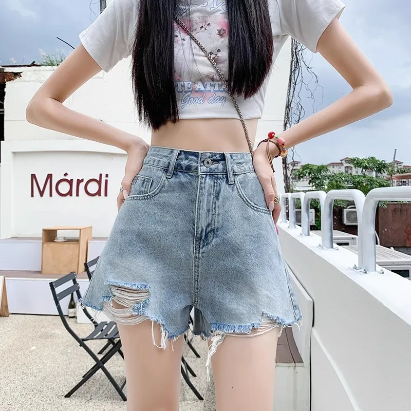 Rugged and perforated denim shorts for women's 2024 summer new high waisted and slim figure A-line wide leg hot pants