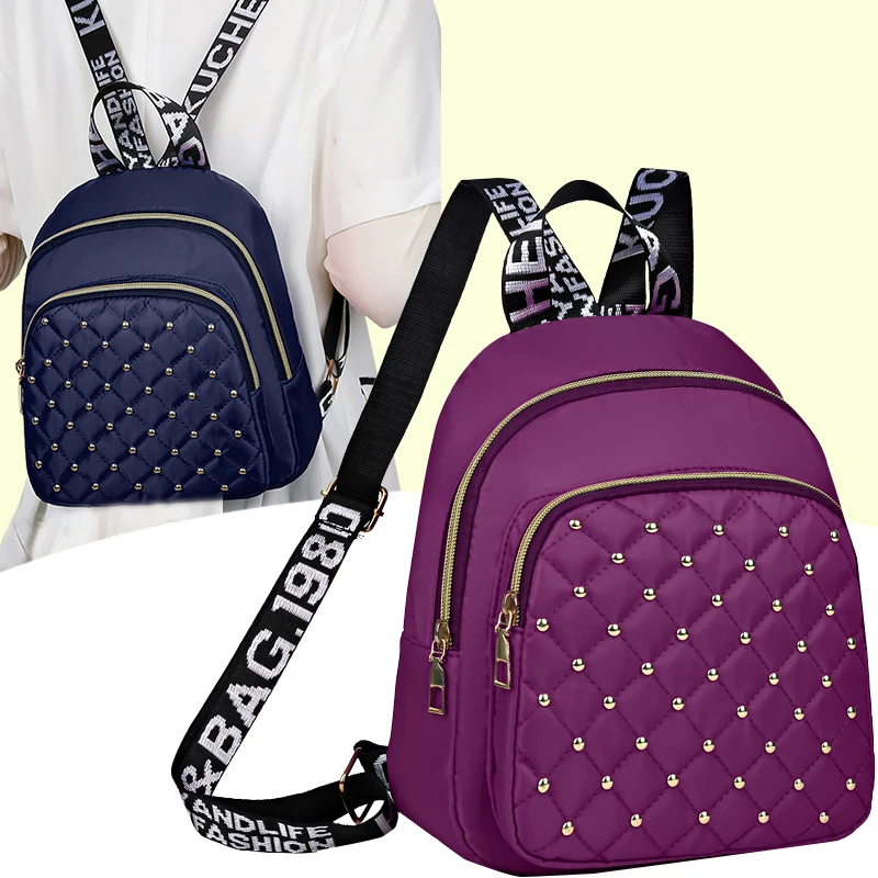 Neutral style backpack for men and women, with shoulder straps featuring letter prints and multiple pockets.