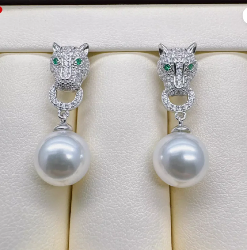 Gorgeous AAAA 10-11mm Natural south sea Round White pearl earring 925s..