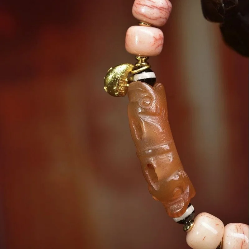 Natural powder-colored semi-translucent camel bone bracelet with single-loop barrel beads, white crystal, glass, and decorative