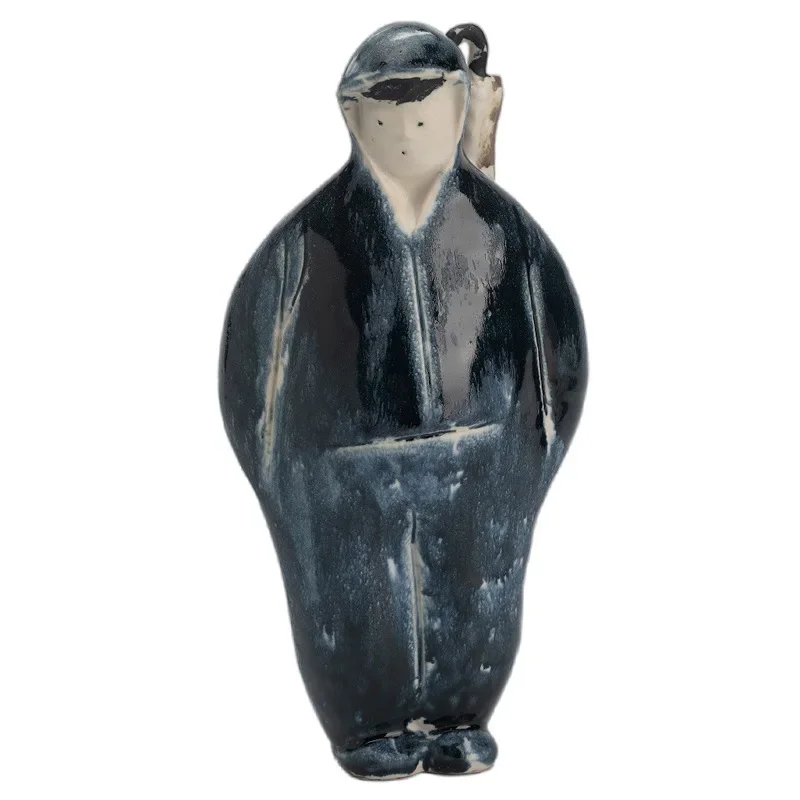 

Handmade pottery figure ornament