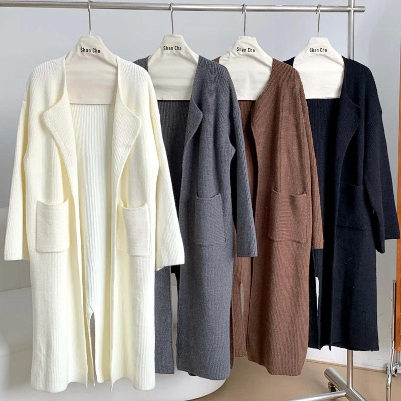 

Qiukichonson Autumn Winter Sweater Cardigan Long Women Korean Casual Pocket Jag Design Design Flare Sleeve Knitted Cardigan Coat