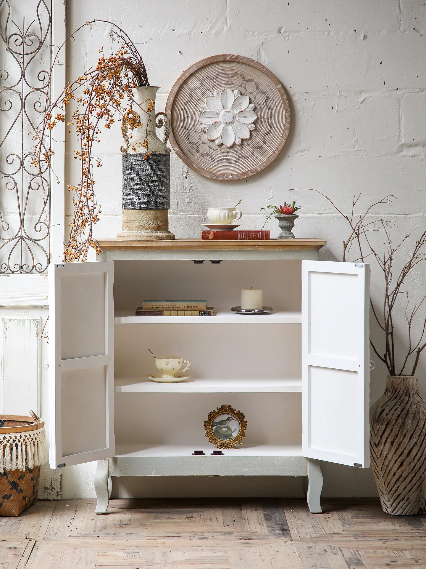Retro and old porch cabinet, integrated with shelves facing the door