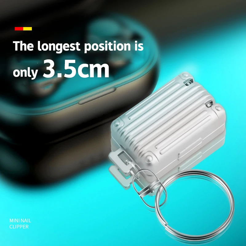 Un nuevo mini cortaúñas plegable de plata, cortaúñas portátil de viaje con llavero, herramienta de manicura