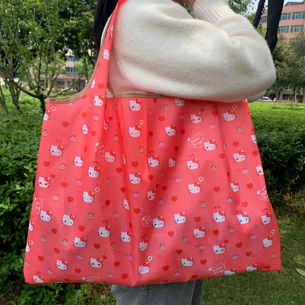 Bolsas de mano de Hello Kitty Sanrio Kuromi para niñas, bolsas de compras de gran capacidad de Anime, bolsa de almacenamiento de viaje plegable, bolso de mano Kawaii portátil