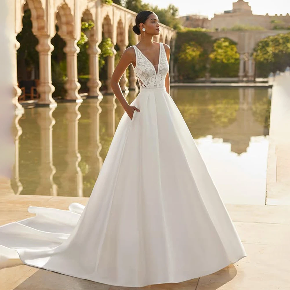 

Boho V-neck Appliques Lace Backless Wedding Dress Satin Floor Length A-line Pockets Bridal Dress with Train Custom Made