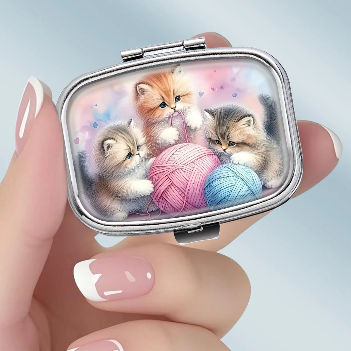 1PC Cute and Adorable Metal Pill Box with a Scene of a Kitten Playing with a Yarn Ball - Square 2-Compartment Portable Medicine Storage Box, Food-Grade Vitamin Organizer, Perfect for Travel or as a Handheld Decorative Gift, Lightweight Design, Specially Designed for Daily Medication Use