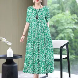 2024 New Elegant Summer Women's Round Neck Printed Patchwork Pocket Fashion Versatile Short Sleeve Loose Medium Length Dress