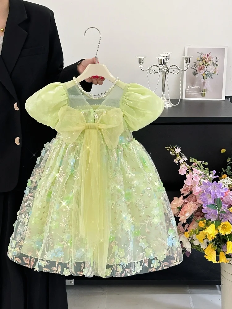 Letnia sukienka dla dziewczynek z motywem kwiatowym, bufiaste rękawki, spódniczka, moda dziecięca, wiązana.