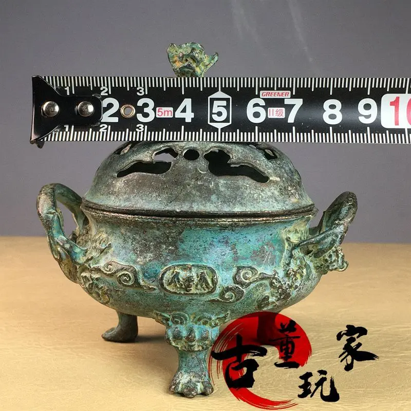 Vintage bronze-colored carved double-eared three-legged auspicious beast incense burner Xuande censer desktop decoration