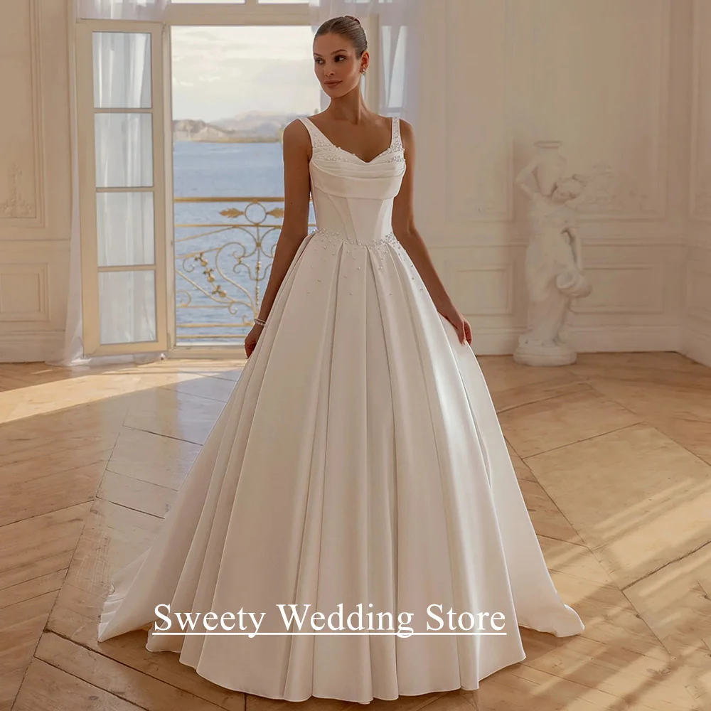 Modernes Satin-Hochzeitskleid, individuell gestaltet, tiefer V-Ausschnitt, ärmellos, Perlenfalte, A-Linie, Sweep-Zug, Korsett, Brautkleid, Robe Mariee