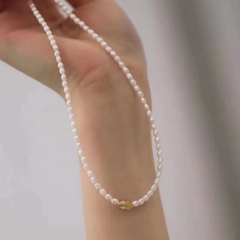 

Rice bead4-5mmNatural Freshwater Pearl Necklace Versatile New Light Luxury Minority Temperament Clavicle Necklace Wholesale