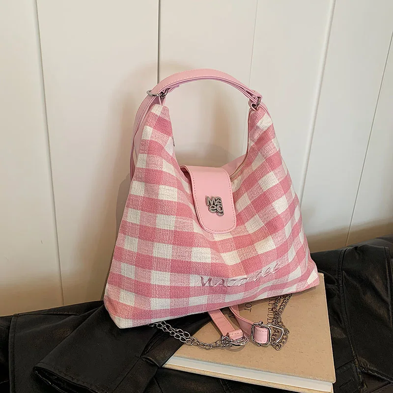 

Korean version large capacity contrasting checkered backpack for women's 2024 summer new fashionable and versatile tote bag tren