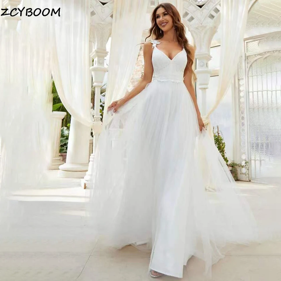 

Customized Elegant Deep V Neck Spaghetti Straps Lace Appliques A Line Wedding Dress 2025 Open Back Sweep Train Tulle Bridal Gown