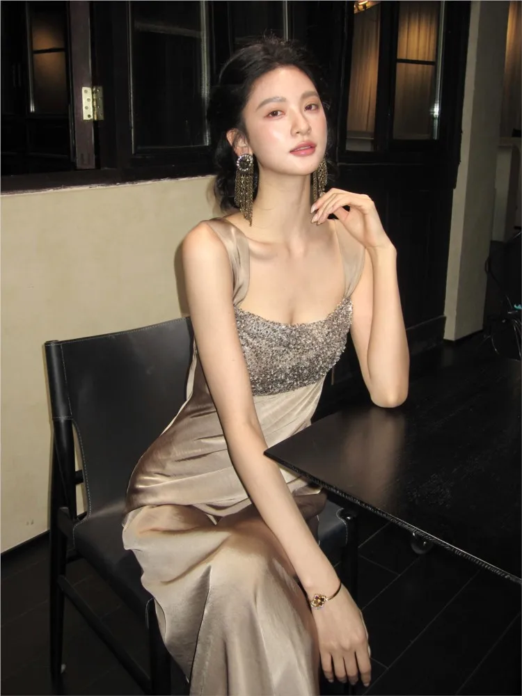 

Beige light luxury satin halter beaded fishtail dress