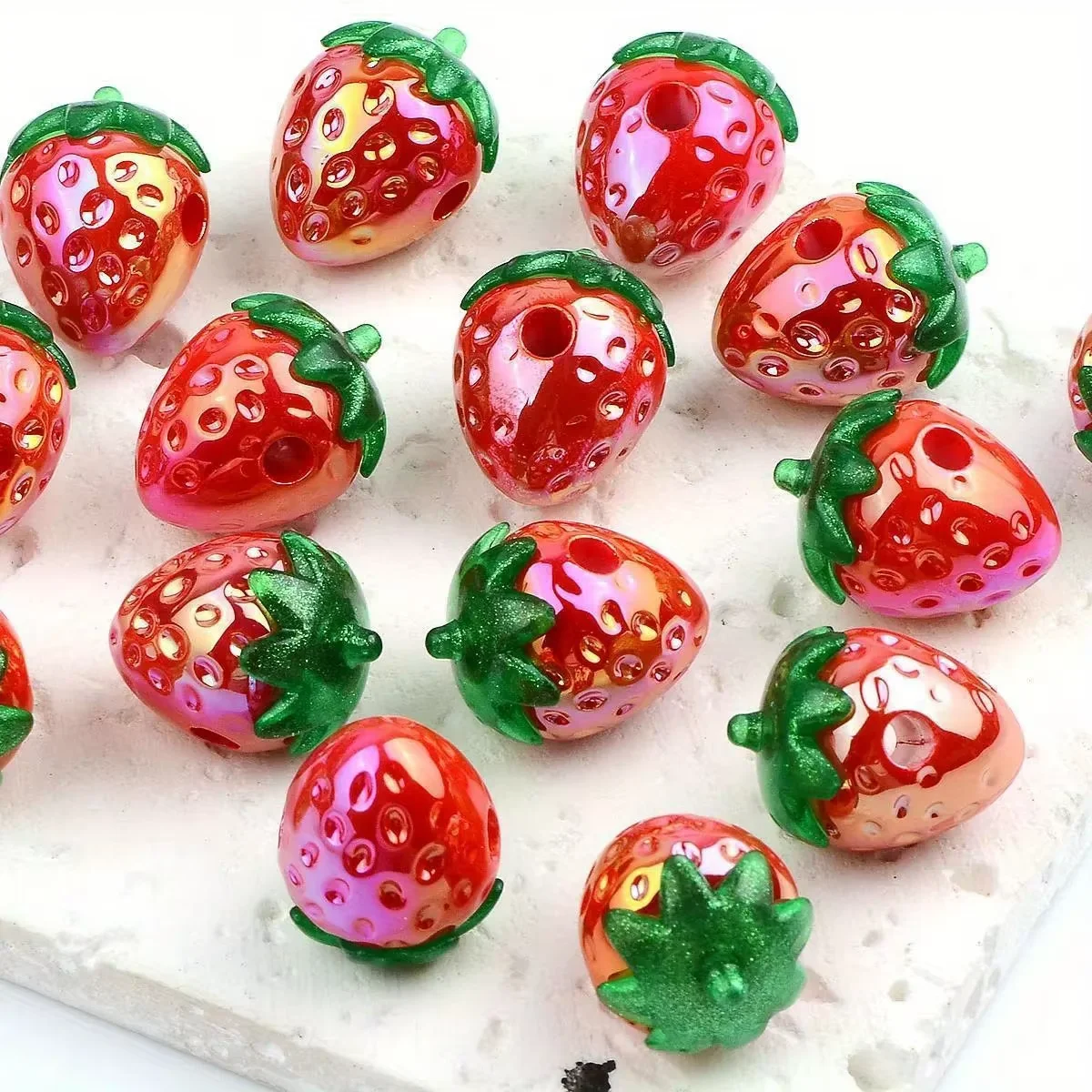 12 red strawberry acrylic beads, suitable for DIY projects such as handmade bracelets, necklaces, and phone charms.