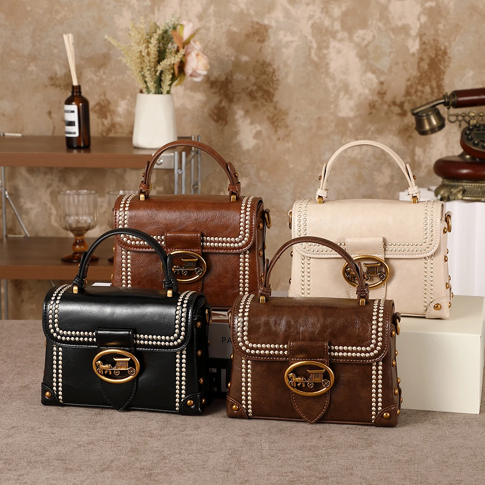 

Women's handbag 2026 new autumn and winter high-end retro wide shoulder strap fashionable single shoulder crossbody small square