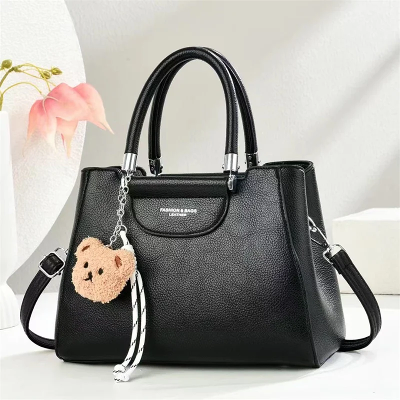 

Stylish Crossbody Bag Ladies Handbag Made of Genuine Leather with Gold Accents Fashionable Everyday Essential