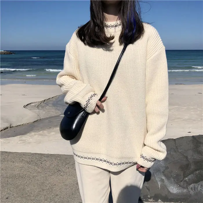 Maglione autunno e inverno nuova versione coreana scuro selvaggio sciolto sciolto pigro foro del vento donne coppia maglione