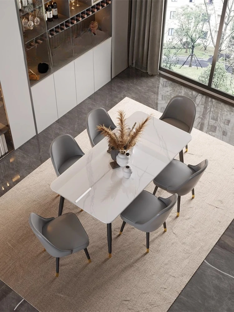 

Italian light luxury bright rock slab dining table and chair combination high-end home modern simplicity high-end minimalist din