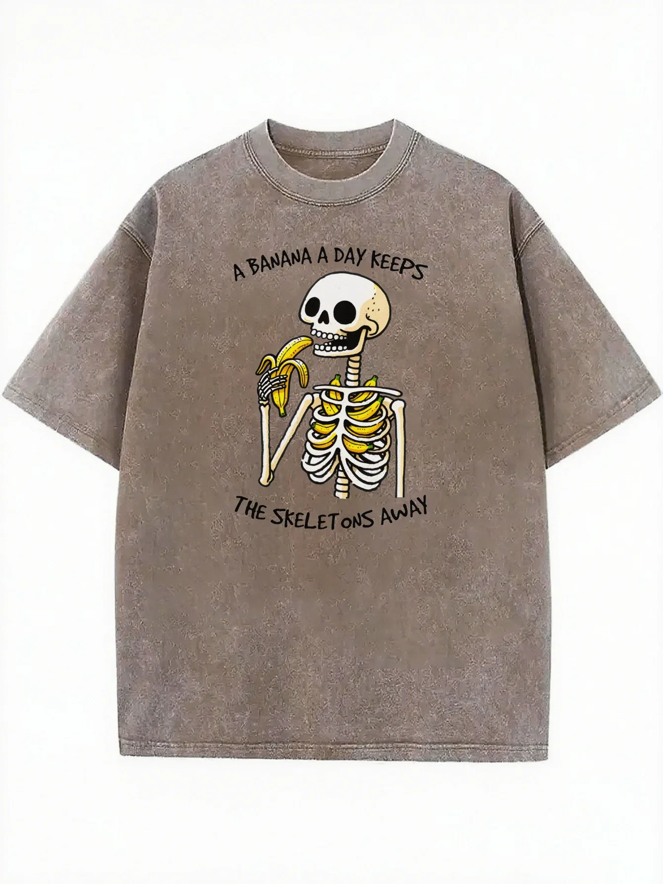 Esqueleto engraçado A BANANA A DAY KEEPS THE SKELETONS AWAY Camiseta feminina solta com gola redonda e lavada, adequada para todos os anos