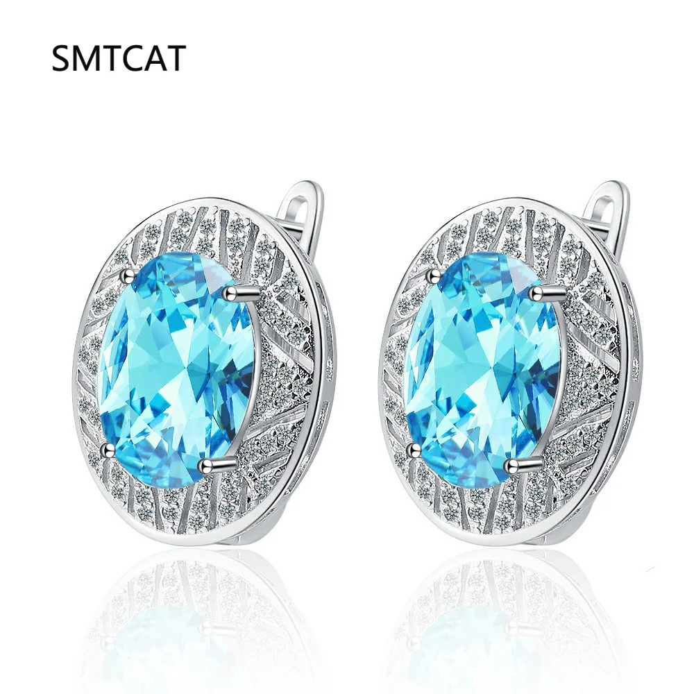 

Oval Cut Genuine Natural Blue Topaz 925 Sterling Silver Hoop Earrings for Women Fashion Statement High Carbon Gemstone Jewelry