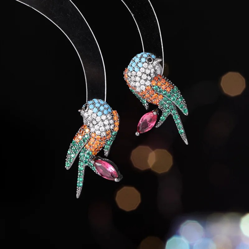 

S925 silver needle stud earrings with micro-inlaid zircon and unique swallow earrings are fresh and sweet earrings for women