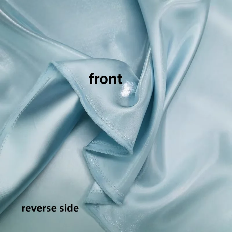 Dark green glossy metal liquid satin fabric with shiny water light satin design dresses suits and DIY sewing materials