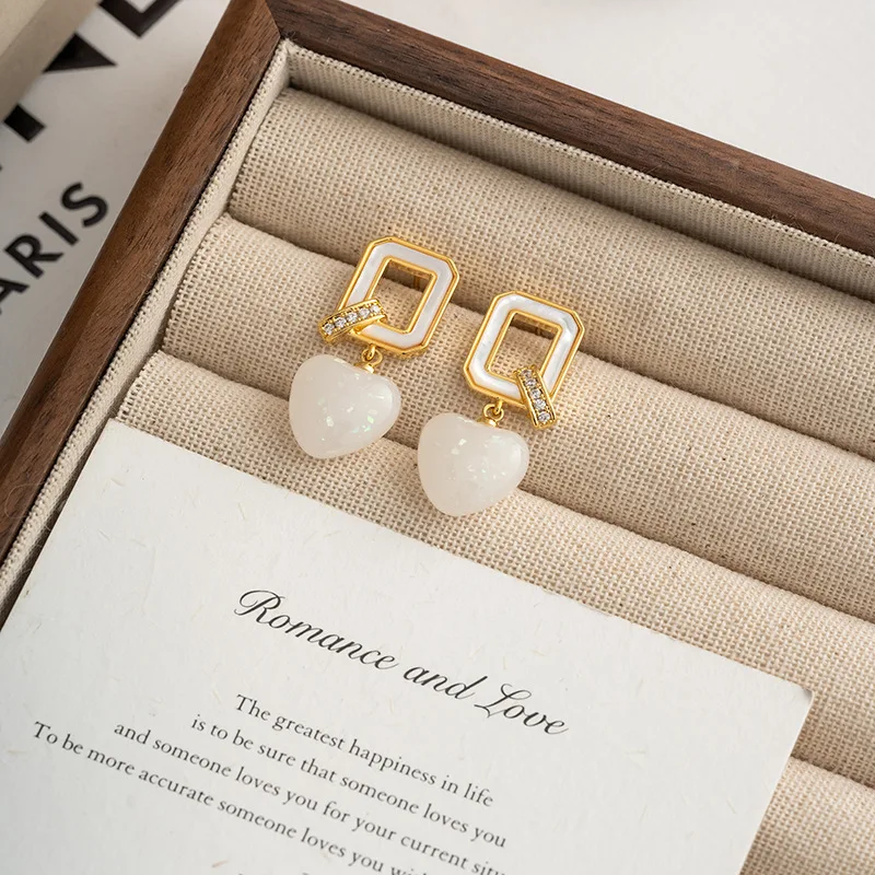 

New White Belly Mother Love Niche Design High-end Light Luxury Fashionable Earrings Women's Jewelry