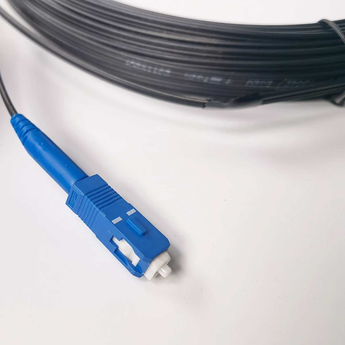 Câble optique 20M/30M Fibra Optica de correction de fibre de mode unique de FTTH de câble optique de baisse extérieure SC/UPC-SC/UPC