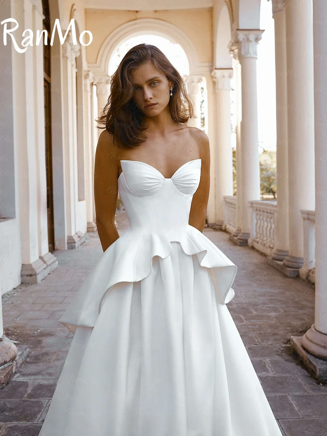 فستان زفاف Ranmo جديد 2025 مثير مخصص بدون حمالات بدون أكمام طيات للنساء أنيق كريب على شكل حرف A بطول الأرض فستان العروس