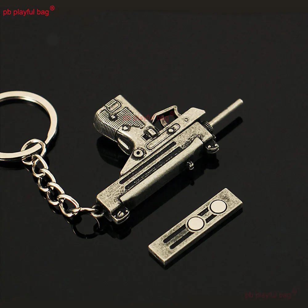 5cm Mini UZI arma de juguete modelo llavero colgante llavero de Metal extraíble decoración manualidades juego figura de acción regalos para niños ZG397