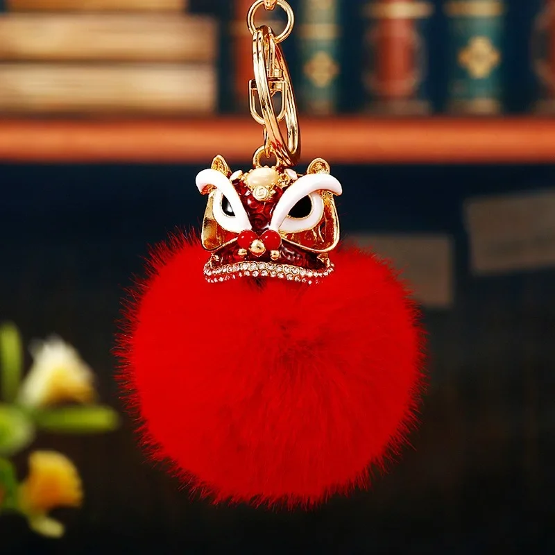 Diamond lion dance car keychain metal cute men's and women's bag pendant key chain ring plush pendant