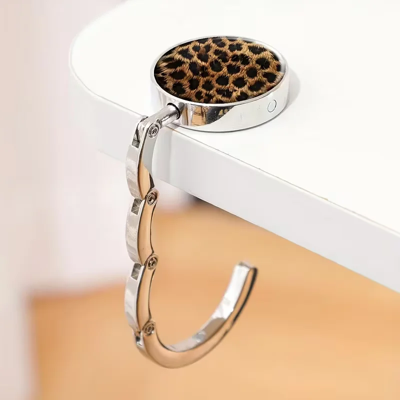 Zinklegierungs-Geldbörsenhalter, lässiger, faltbarer Handtaschenhalter, tragbarer Tisch-Taschenhalter – Detail 4