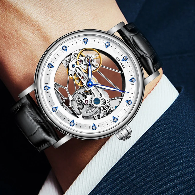 KINYUED العلامة التجارية الجديدة الفاخرة تصميم جوفاء الهيكل العظمي ساعة ميكانيكية للرجال حزام من الجلد مقاوم للماء موضة ساعات أوتوماتيكية رجالي