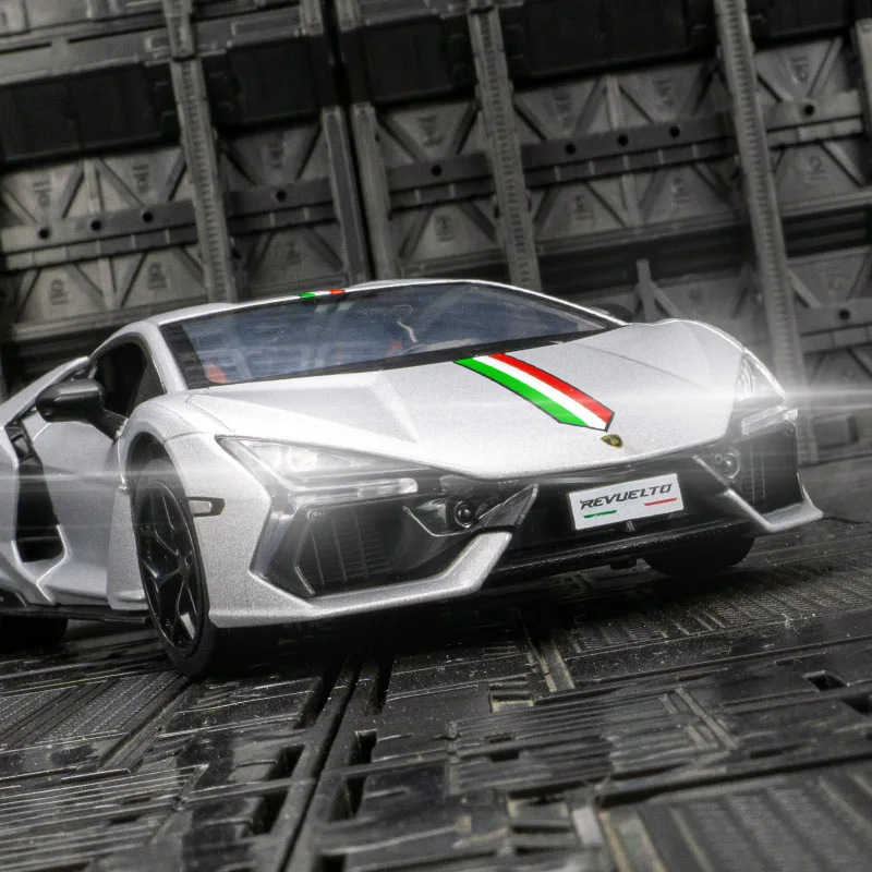 

Модель автомобиля Lamborghini Revuelto из сплава металлов в масштабе 1:24 с открывающимися дверями, имитацией звука и световых эффектов.