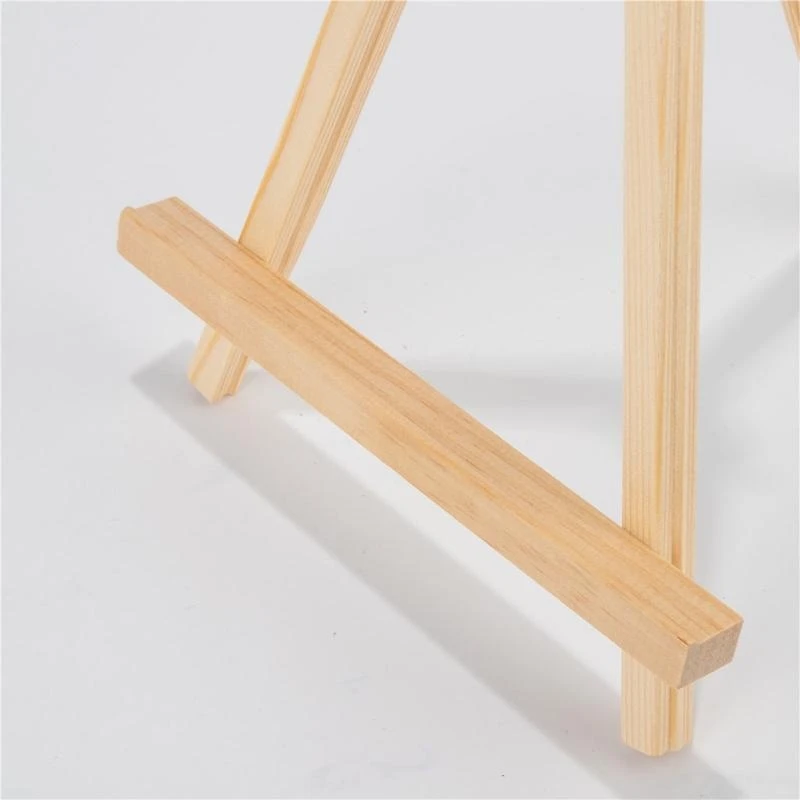 Cavalletto in legno per display triangolare utilizzato come supporto per telefono cellulare. oggetto. migliore