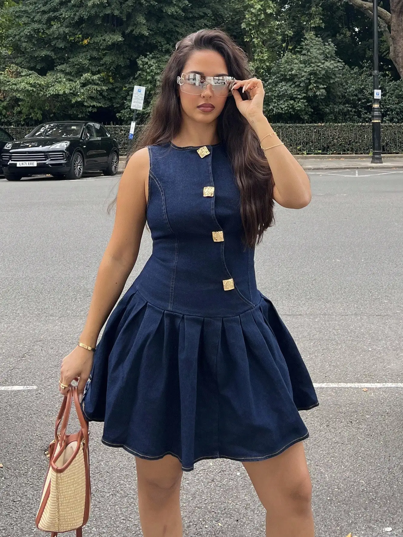 

Women Denim Dress Sleeveless Pleated Hem Metal Button A-Line Mini Dress