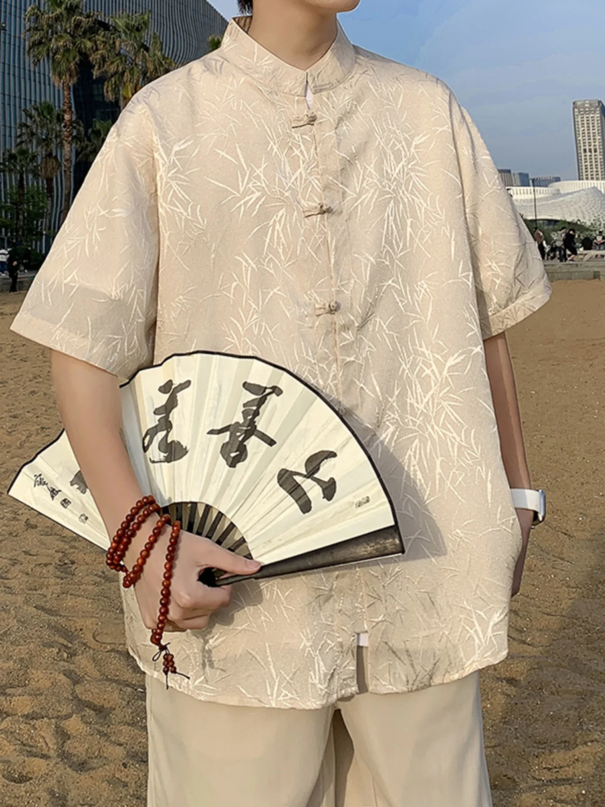 

New Chinese Sle Ice Silk ort Sve irt Men's 2024 Bamboo Le Stand Collar Button down Tang Costume Trendy Casual Wear