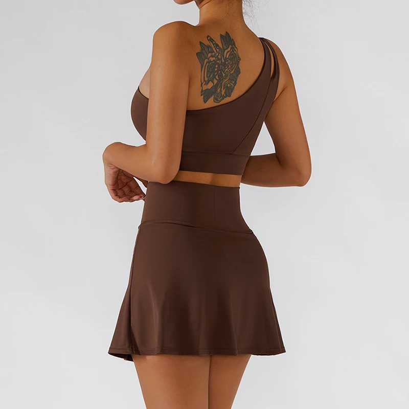 2 قطعة تنورة رياضية قصيرة اليوغا مجموعة النساء فستان التنس الصالة الرياضية البدلة الرياضة حمالات الصدر قصيرة تنورة الغولف تجريب مجموعات اللياقة البدنية الملابس
