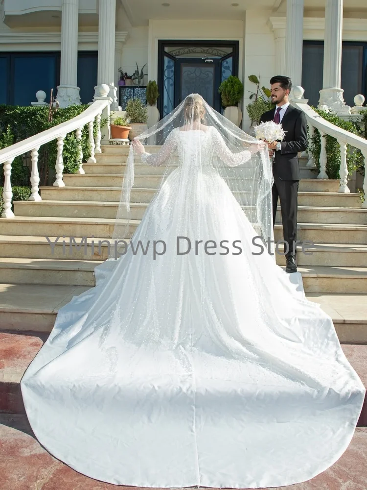 Robes de mariée de luxe col rond à manches longues robe de bal robe de mariée d'église avec paillettes perles balayage Train robe de mariée personnalisée