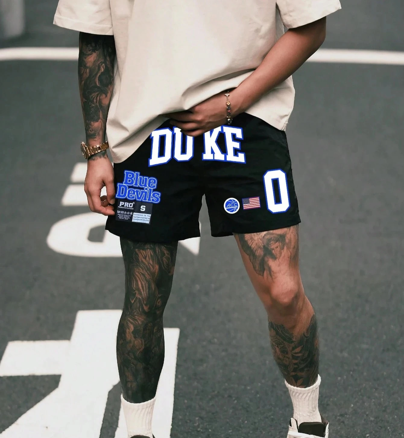 

Мужские однотонные спортивные шорты с графическим принтом, завязками на талии, боковыми карманами и свободным кроем