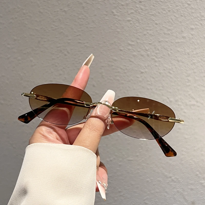 KAMMPT Randlose Ovale Sonnenbrille für Damen 2026 Neue Mode Vintage Casual Shades Trendige Stilvolle Luxusmarken-Design Deko-Sonnenbrillen