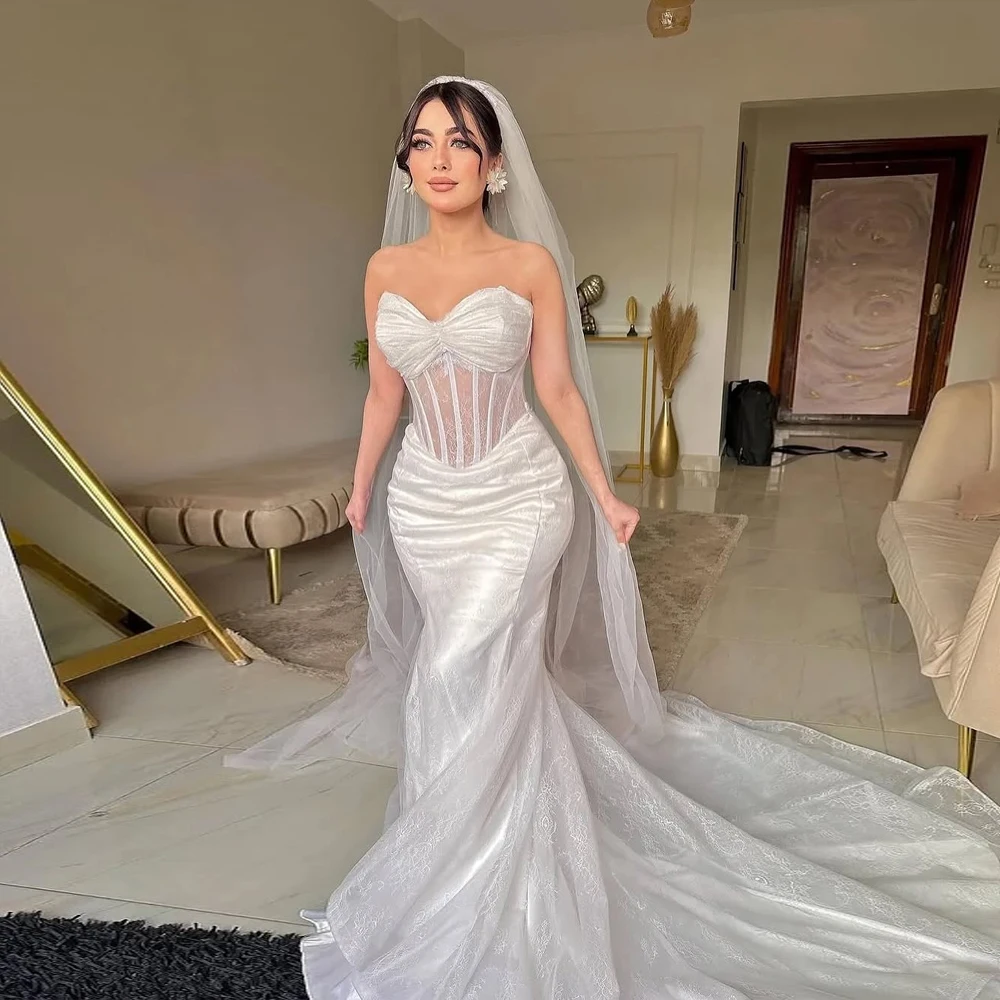 

Lace Ivory Wedding Dresses 2026 Luxury Sleeveless Mermaid Backless Applique Sweetheart Sweep Train Bride Dresses Customized