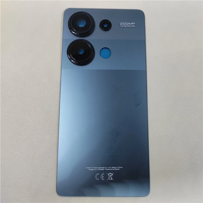 Tylna obudowa z szybką do telefonu Xiaomi Redmi Note 13 Pro 4G, model 23117RA68G, wraz z obudową baterii i tylnym paneliem, oraz zamienną obudowy obiektywu aparatu. — zdjęcie produktu 4